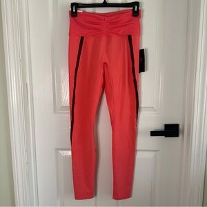Bandier New Balance Leggings Coral Pink with back pocket